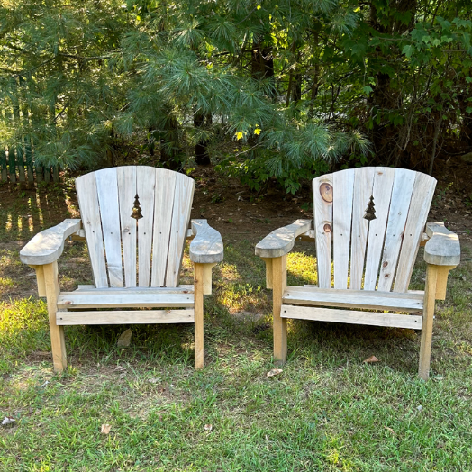 unstained two adirondack chairs